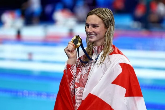 Canadian swimmer sets three world records in five days